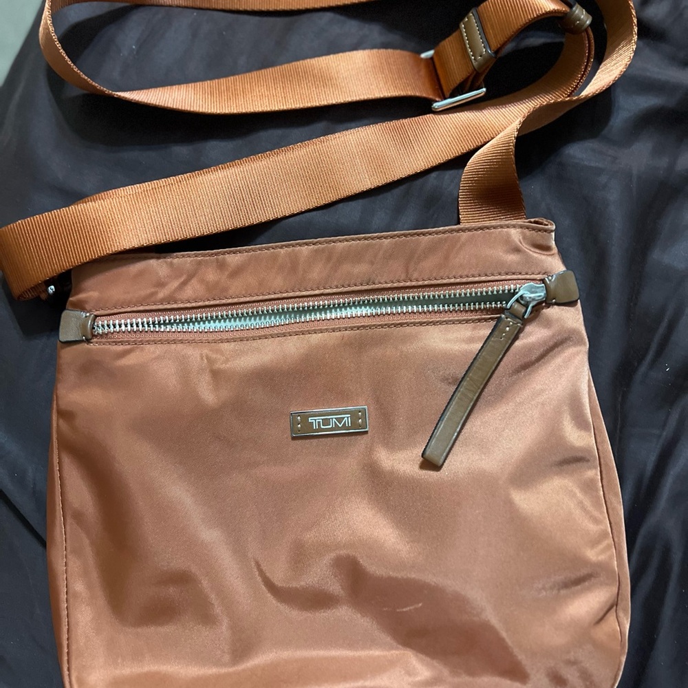 Tumi Brown Messenger Bag with Adjustable Strap and Zippered Compartments